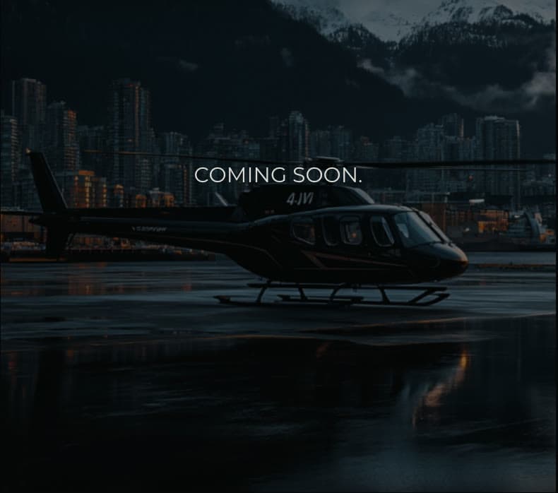 A Herauf helicopter on a waterfront pad, city skyline and mountains behind