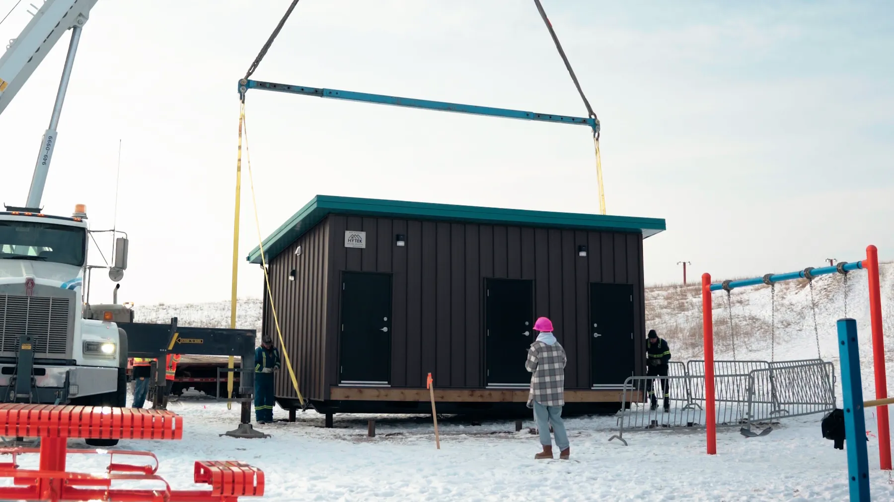Herauf community facility crane-set beside the Pilot Butte spray park