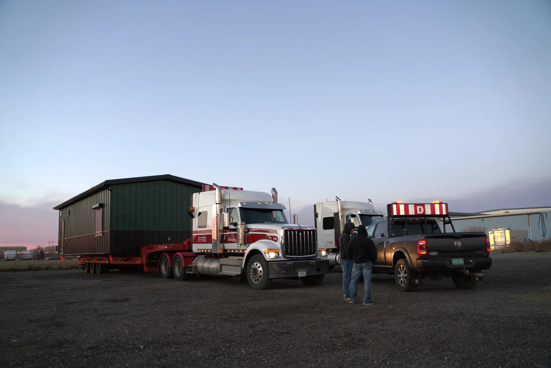 Herauf modular unit loaded on a truck at dusk