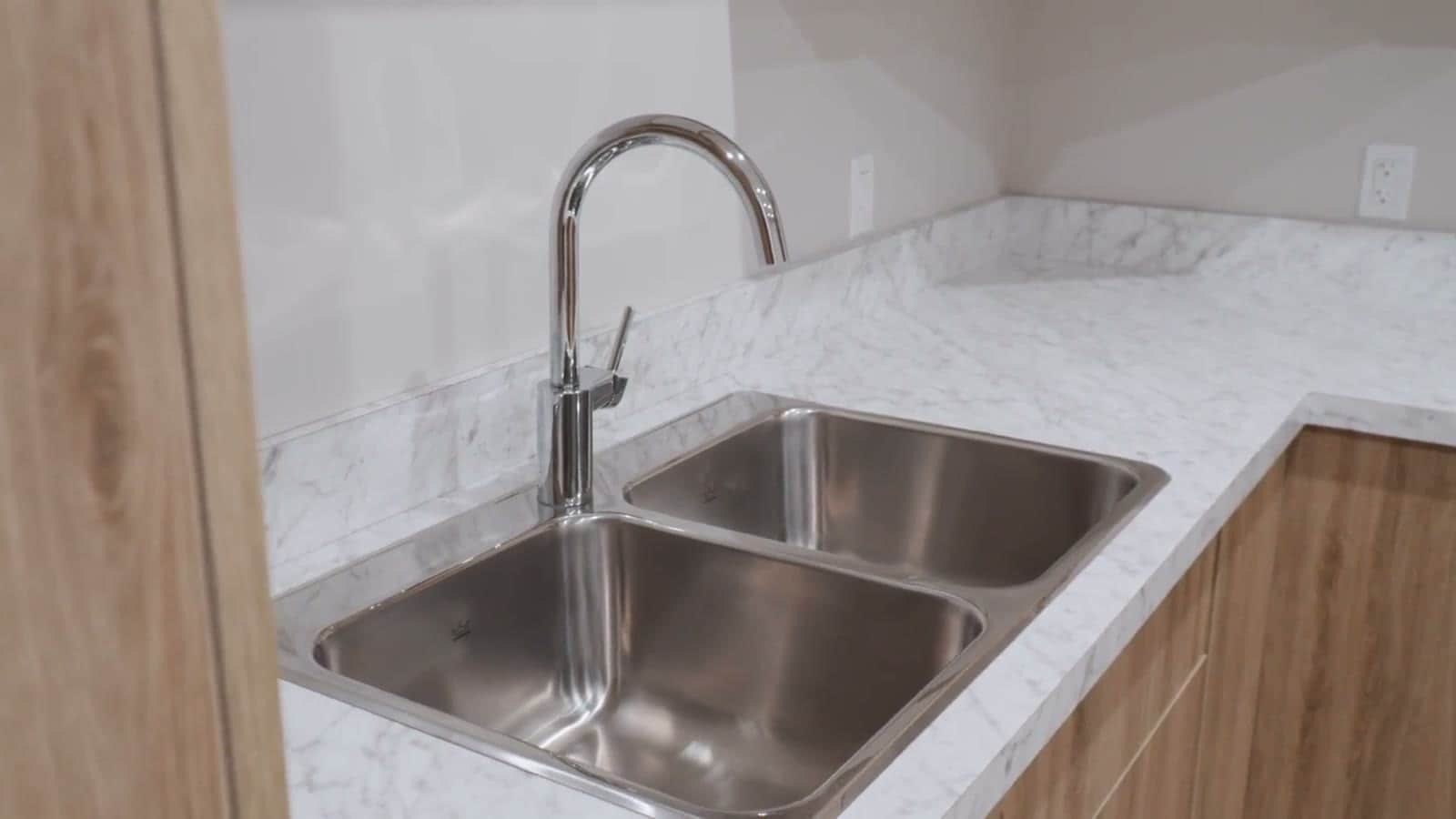 A walkthrough of a finished Herauf modular home interior: kitchen, bedrooms, and bathroom